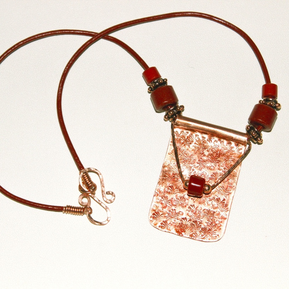Artisan Handmade Copper Pendant and African Beads on Brick Red Leather